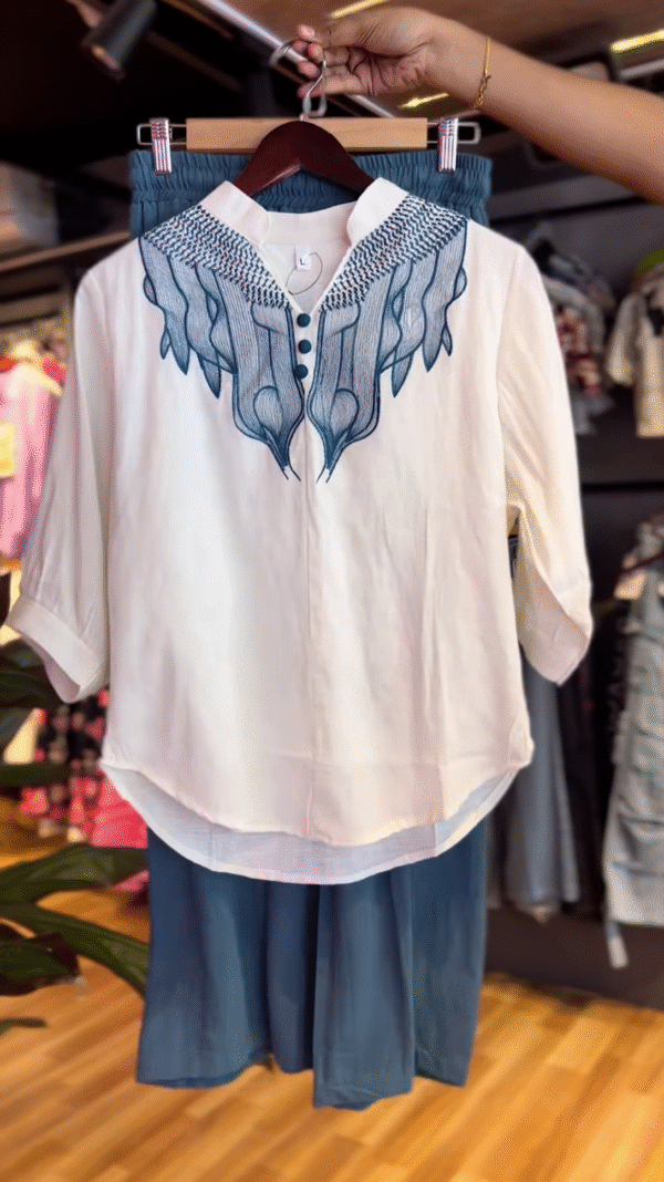 Midnight Mist – Ivory Embroidered Kurta with Teal Trousers