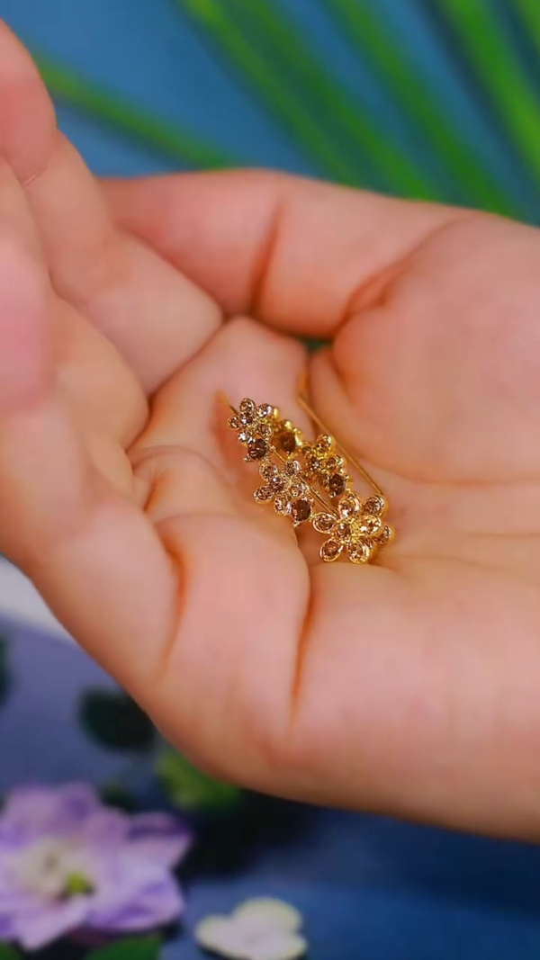 Elegant Gold-Toned Floral Crawler Earrings with Sparkling Crystal Accents - Image 2