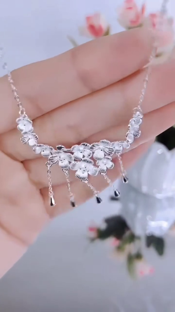Exquisite Sterling Silver Floral Choker Necklace with Dangling Bell Charms - Image 2
