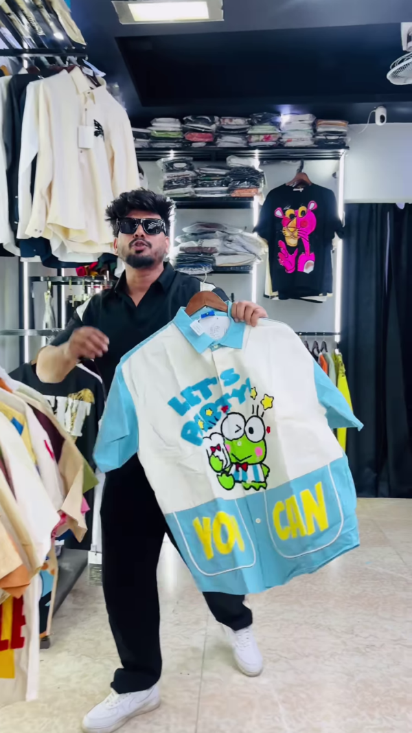 Bold Men's Graphic Print Polo Shirt with Cartoon Characters and Text