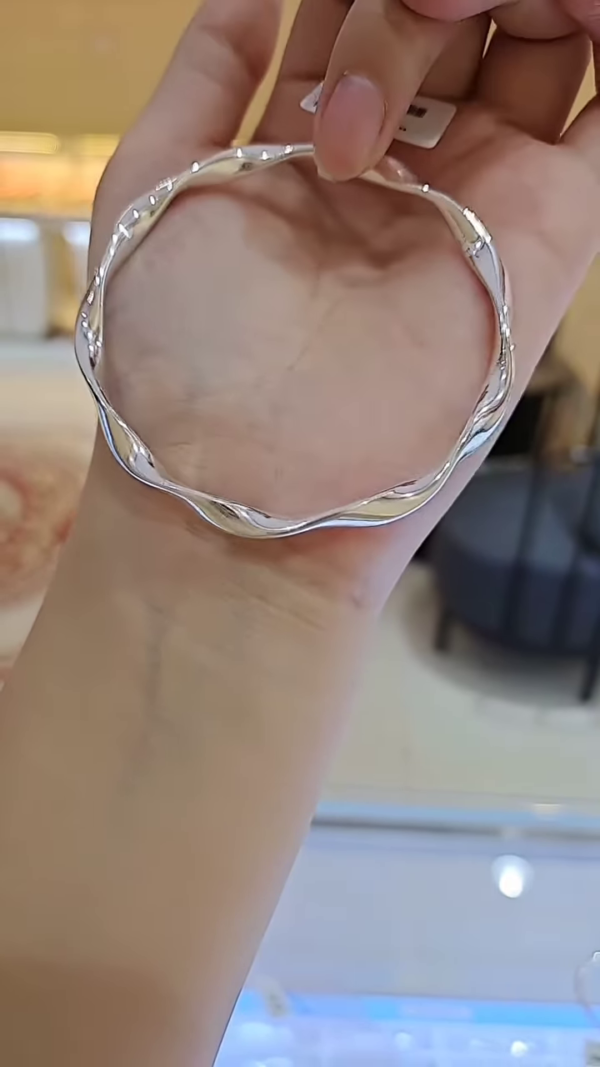 Modernist Twisted Silver Bangle Bracelet for Women - Image 2