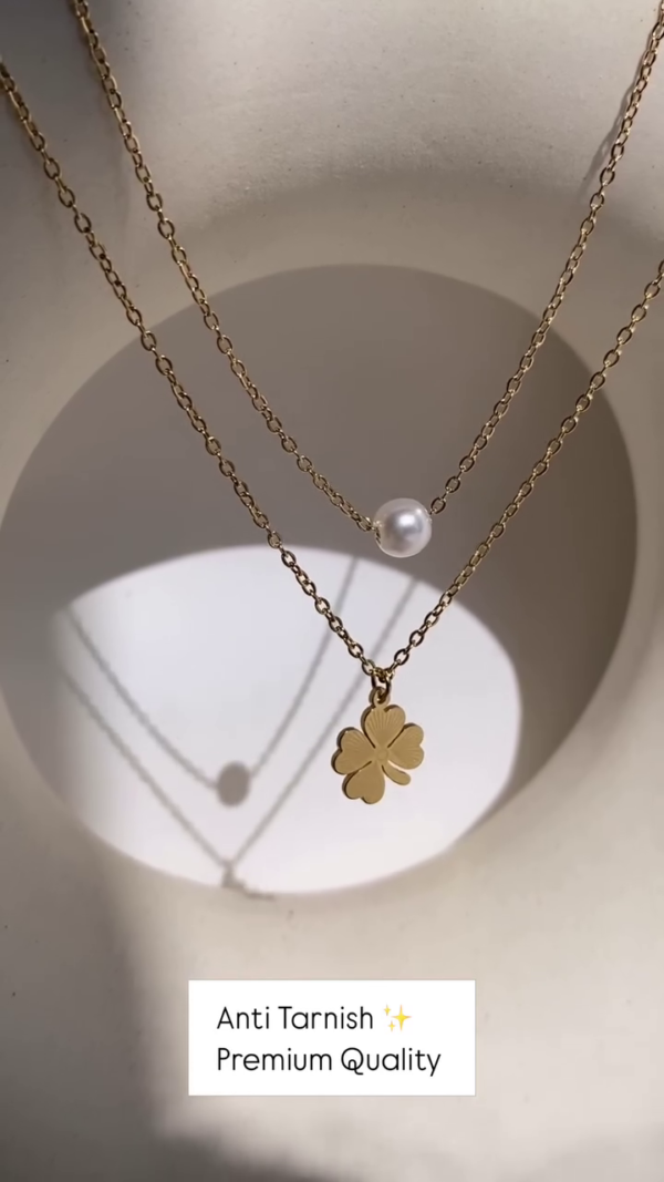 Delicate Layered Gold-Toned Necklace with Four-Leaf Clover and Pearl Pendants