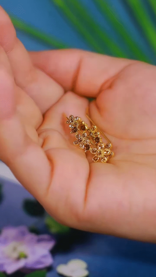 Elegant Gold-Toned Floral Crawler Earrings with Sparkling Crystal Accents - Image 2