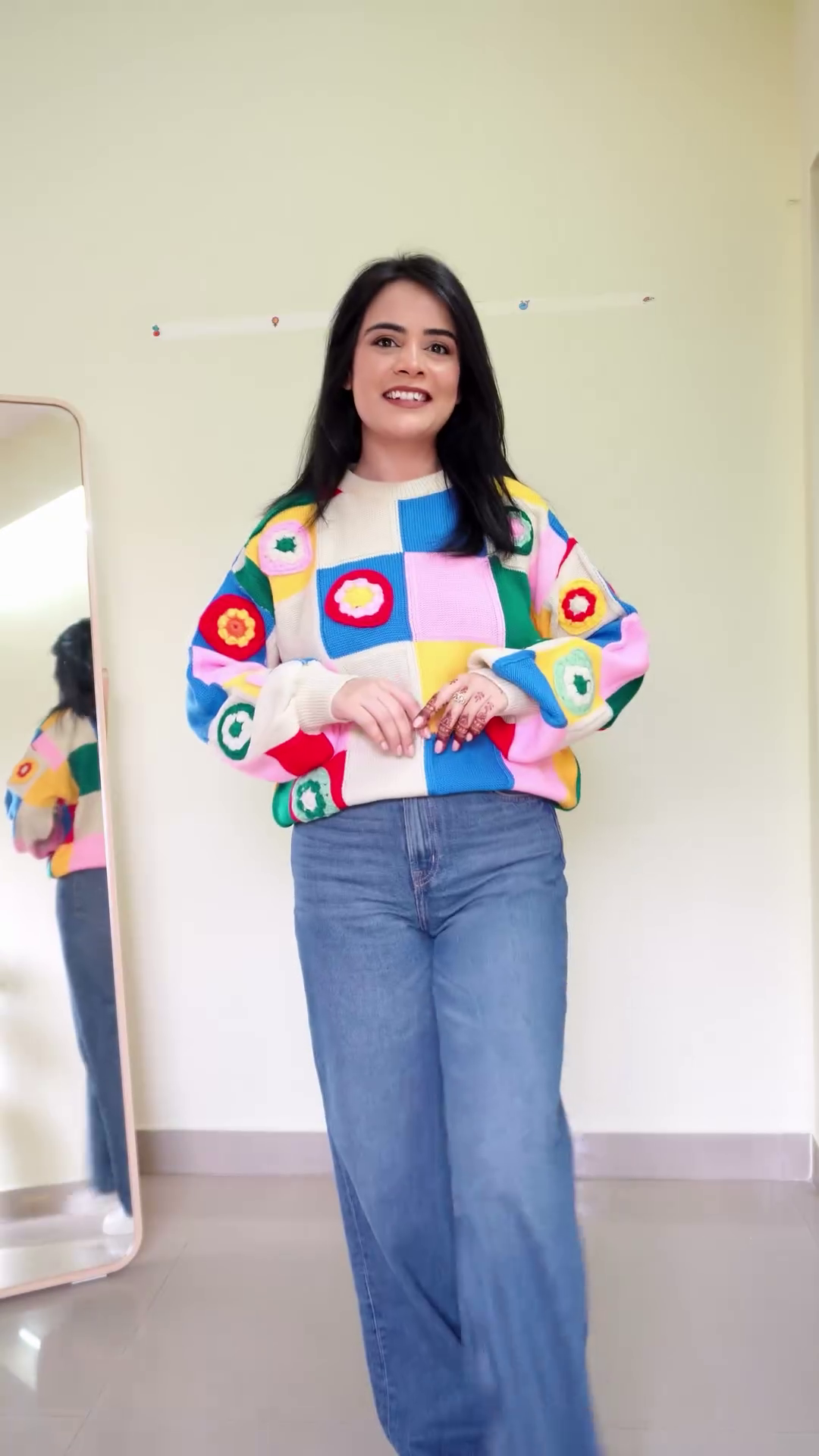 Soft White Fleece Pullover Sweatshirt with Multicolor 3D Bow Appliqué Embellishments and Relaxed Balloon Sleeves Paired with Classic Blue Wide-Leg Denim Jeans - Image 2