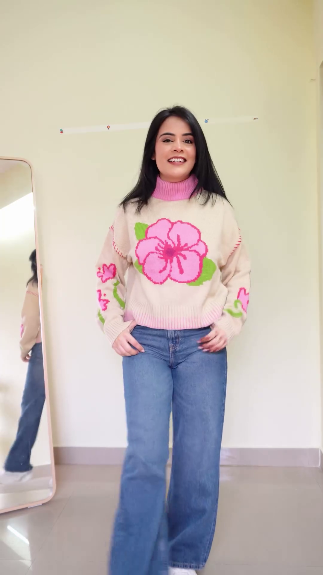 Soft White Fleece Pullover Sweatshirt with Multicolor 3D Bow Appliqué Embellishments and Relaxed Balloon Sleeves Paired with Classic Blue Wide-Leg Denim Jeans - Image 5