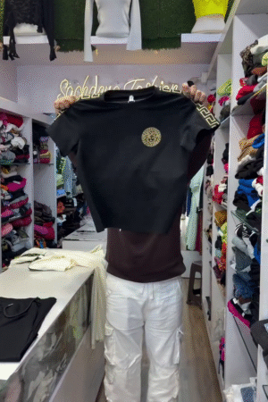 Fashion T-Shirt with Golden Emblem Chest Detail and Pattern Sleeve Design for Women